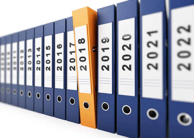 blue-box-files-in-a-line-labled-with-year-dates