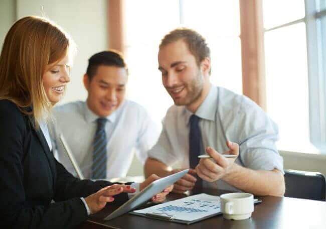business-people-looking-at-finance-reports business-people-looking-at-finance-reports