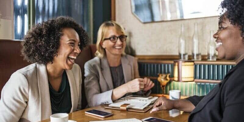 business-ladies-having-coffee Bells Accountants