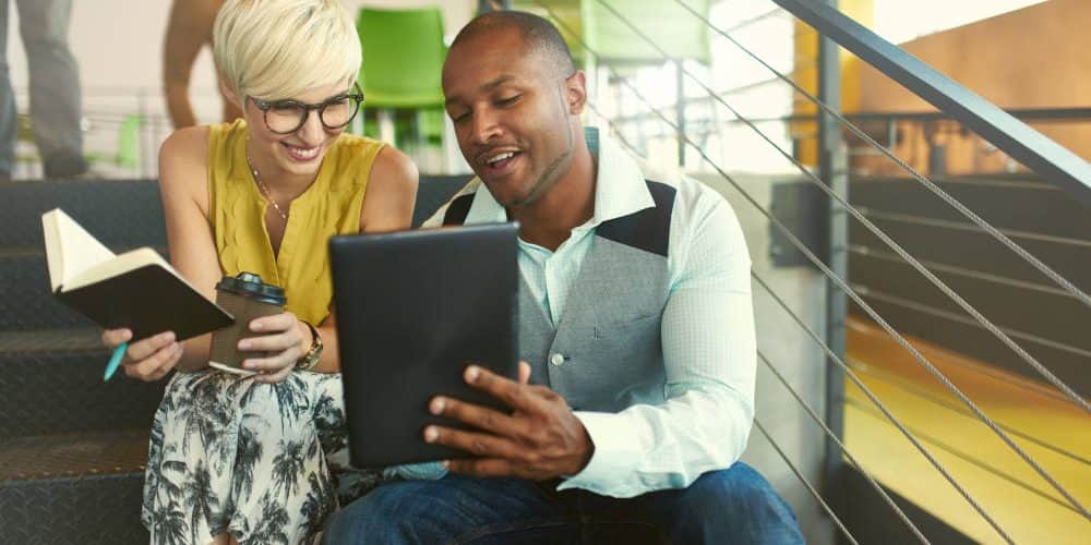 Two,Creative,Millenial,Small,Business,Owners,Working,On,Social,Media